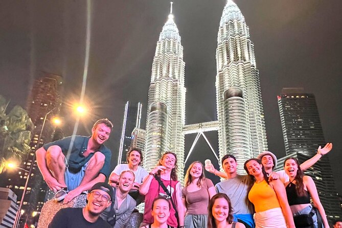 Authentic Malaysian Street Food Tour With 15+ Tastings Near KLCC - Crossing Saloma Link toward the towers