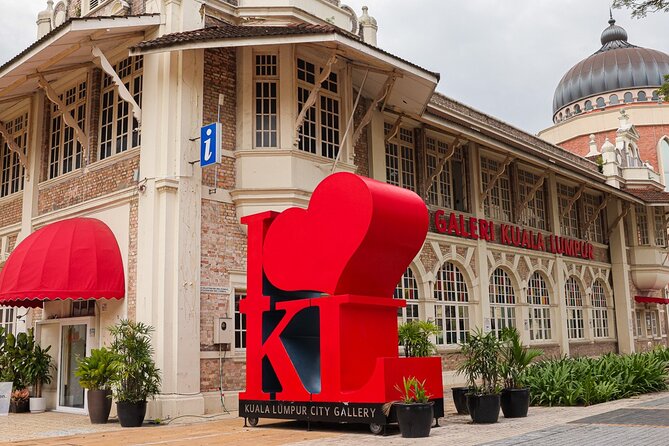 Ten Wonders Of Kuala Lumpur Shared Tour - River of Life and the old center